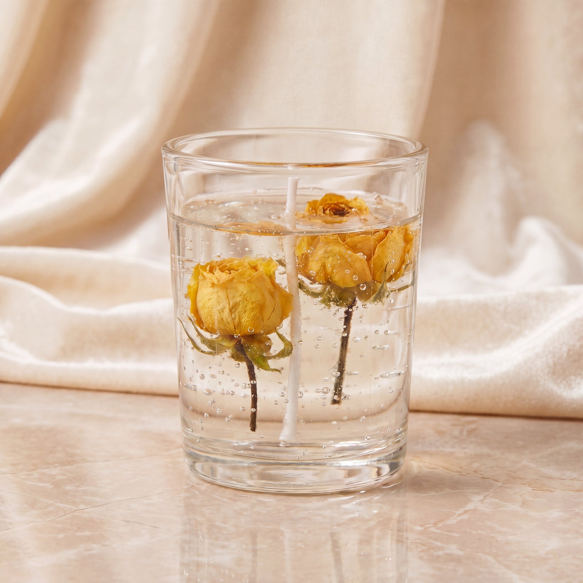Rose gel wax scented candle front view in clear glass