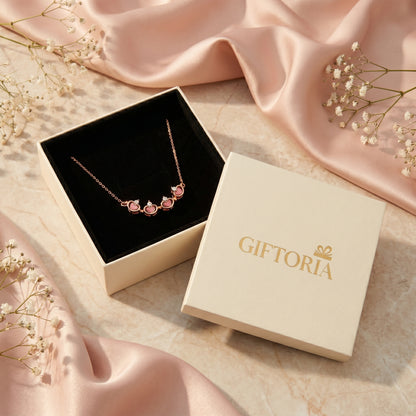 Giftoria rose gold lucky clover necklace presented in a ready to give gift box