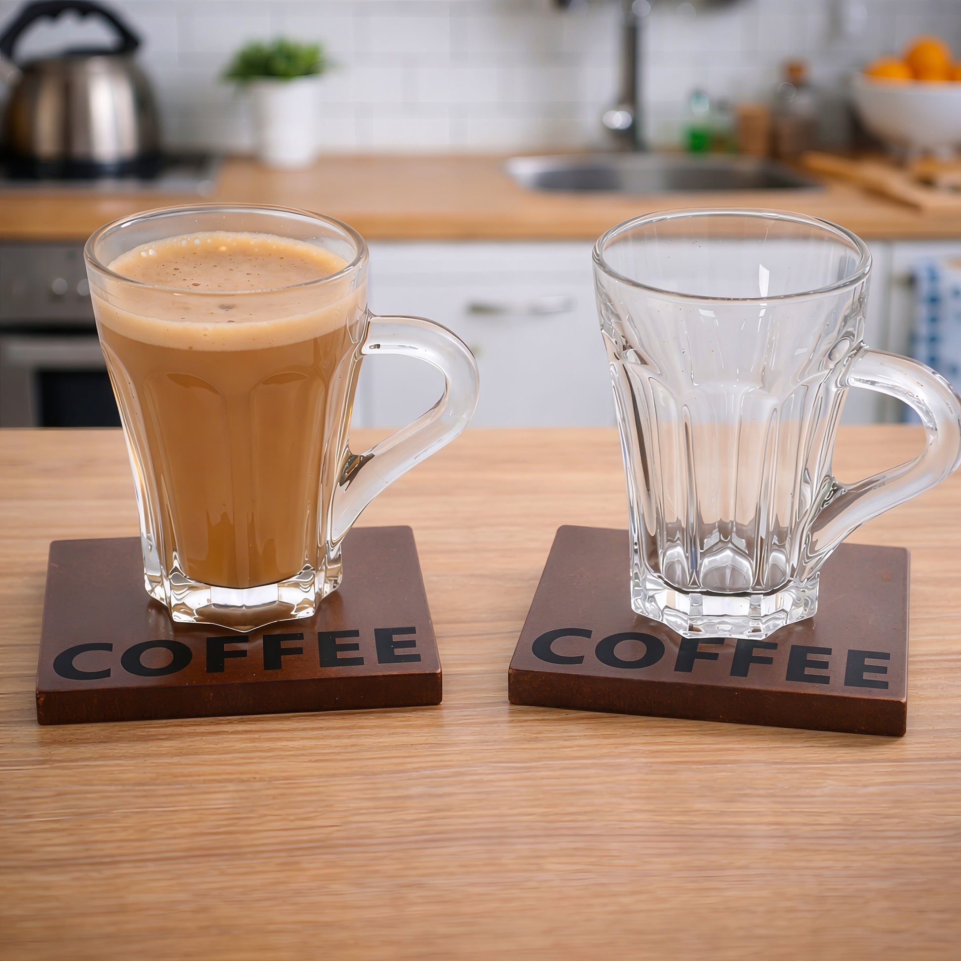 Glass coffee mug shown empty and filled as part of coffee gift set