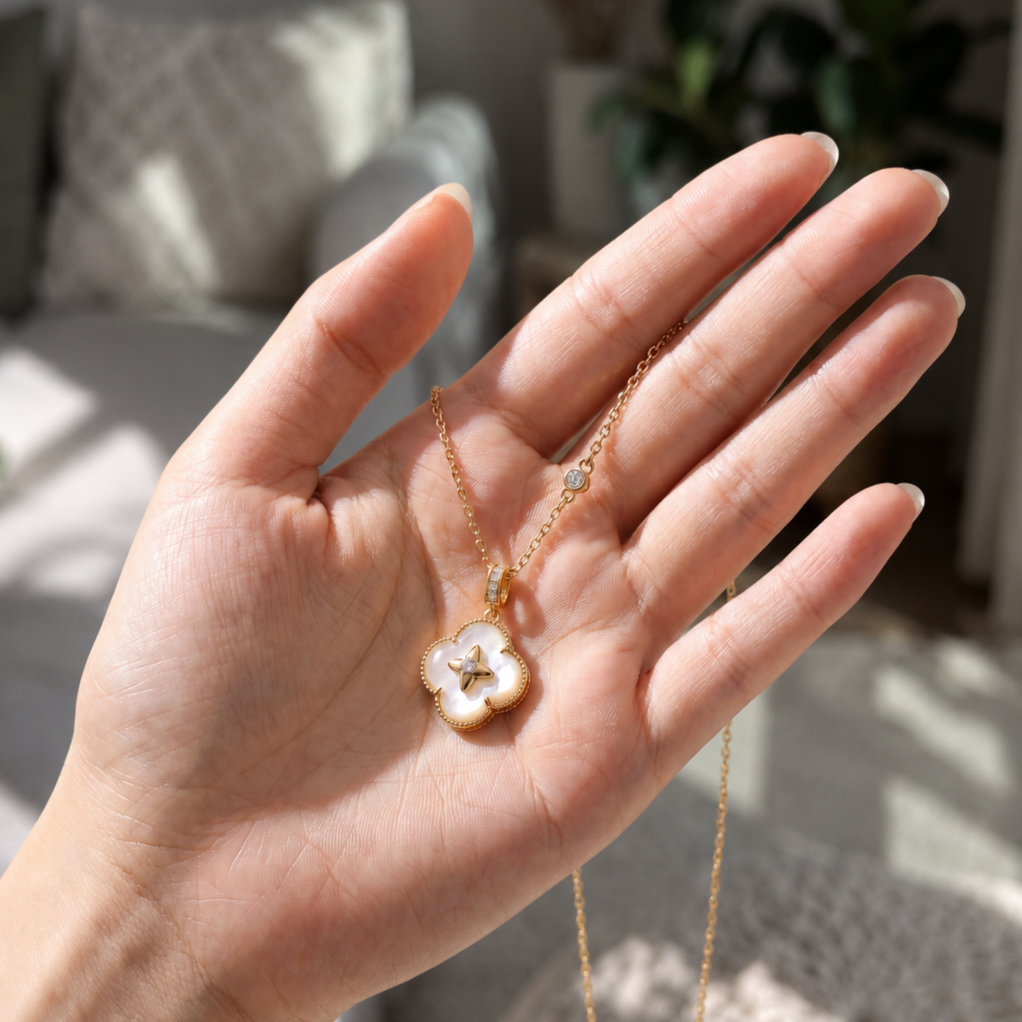 Gold Mother of Pearl Lucky Clover 925 Sterling Silver Necklace in hand