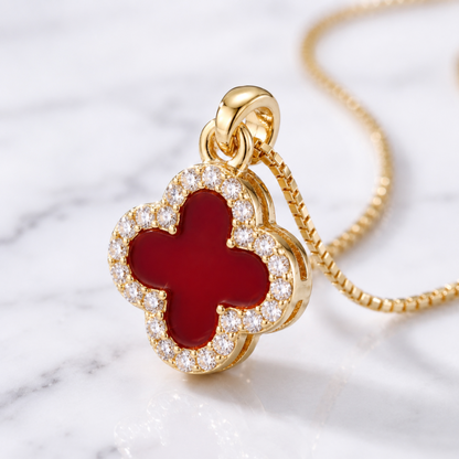 gold red four leaf clover pendant necklace close up
