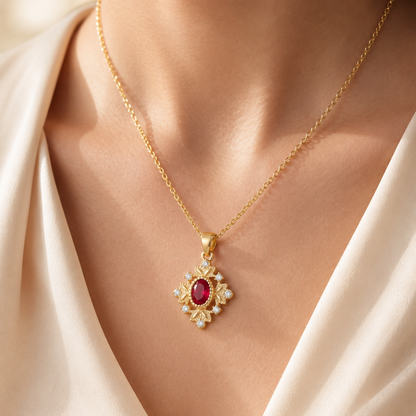 Gold 925 sterling silver ruby red vintage pendant necklace worn with an elegant white outfit