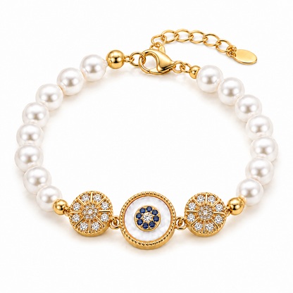 Gold Sunburst Evil Eye Pearl Bracelet with white pearls and adjustable chain