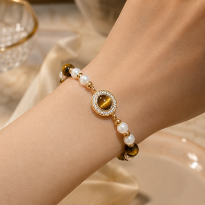 Gold Tiger Eye Pearl Halo Bracelet worn on a woman’s wrist