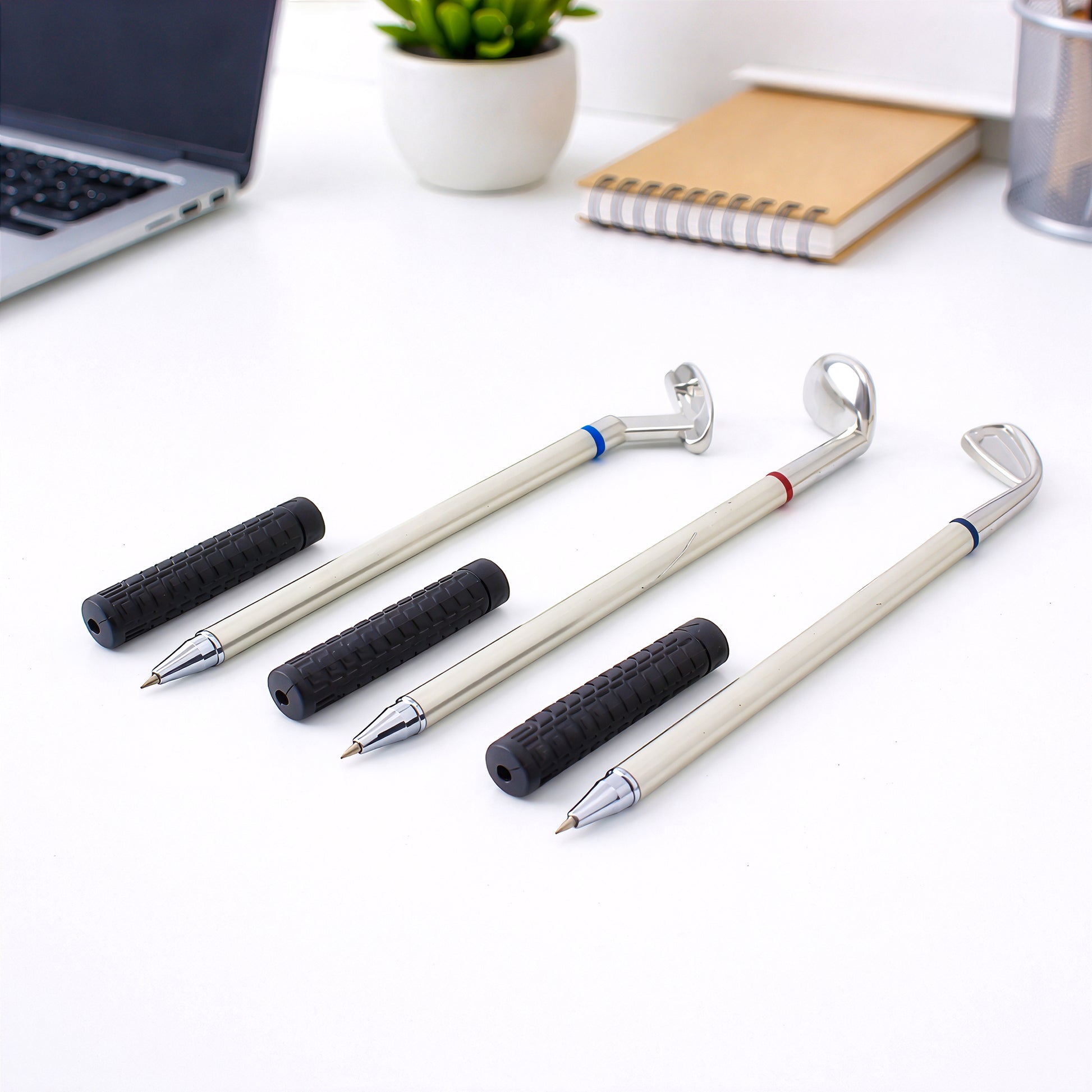 Golf pen set desk gift for him on white table background
