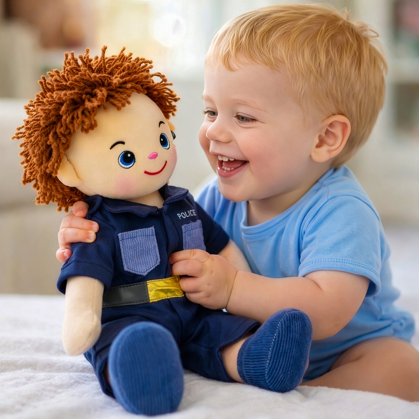 Happy boy holding Lewis plush doll toy as kids gift