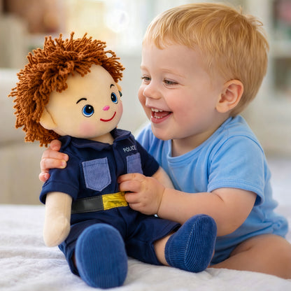 Happy boy holding Lewis plush doll toy as kids gift
