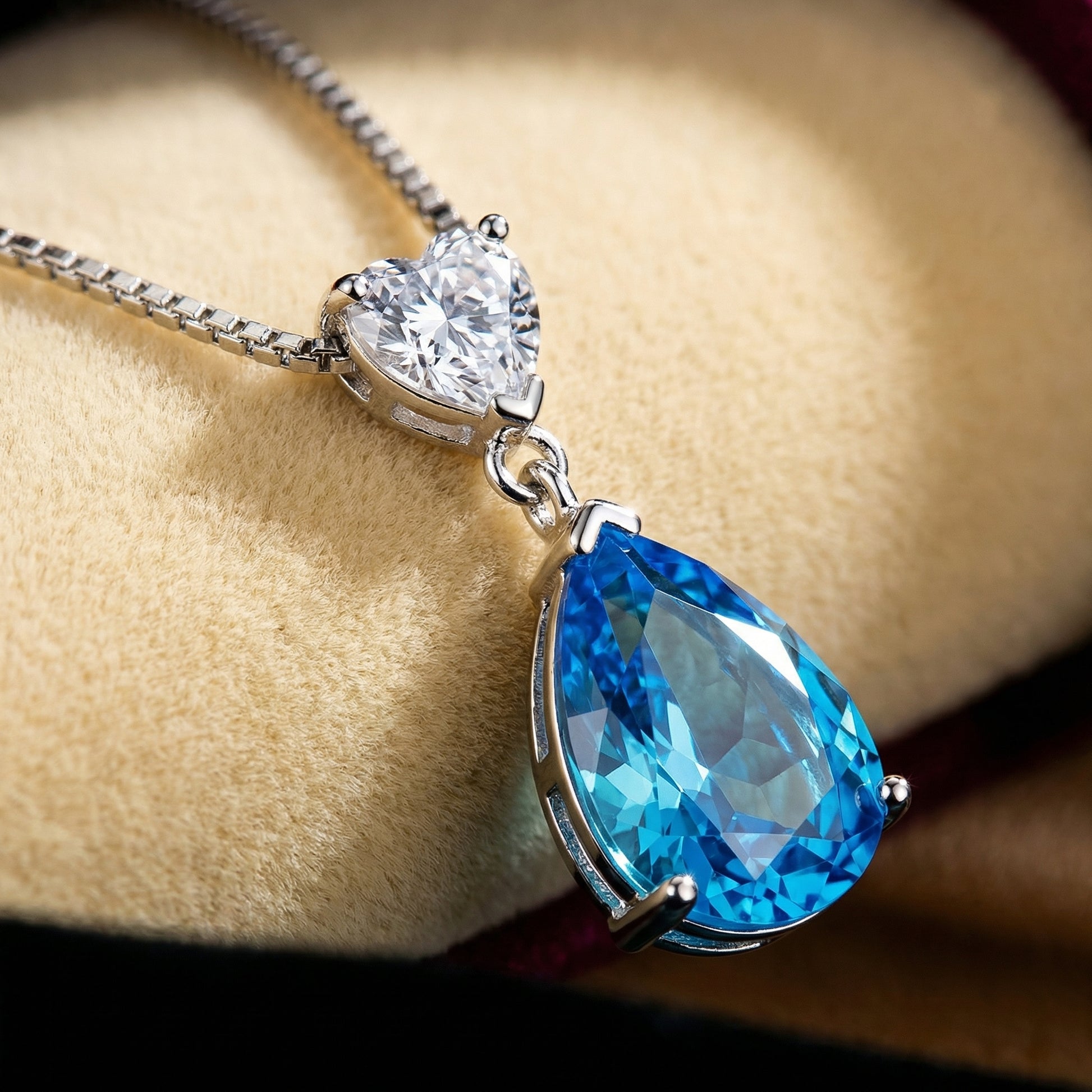 Heart of the Ocean inspired blue cubic zirconia necklace detail with 925 sterling silver setting and sparkling teardrop pendant