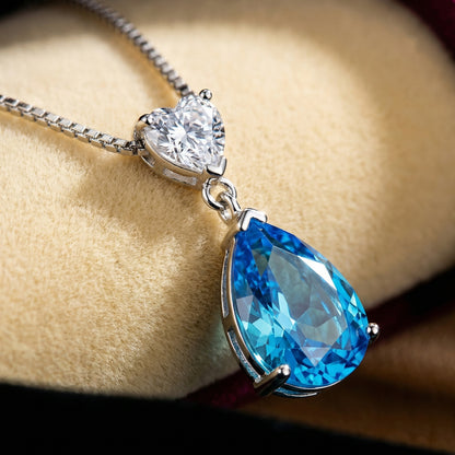 Heart of the Ocean inspired blue cubic zirconia necklace detail with 925 sterling silver setting and sparkling teardrop pendant
