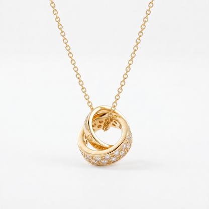 Gold Interlocking Circle Pendant Necklace with sparkling crystal detail on white background
