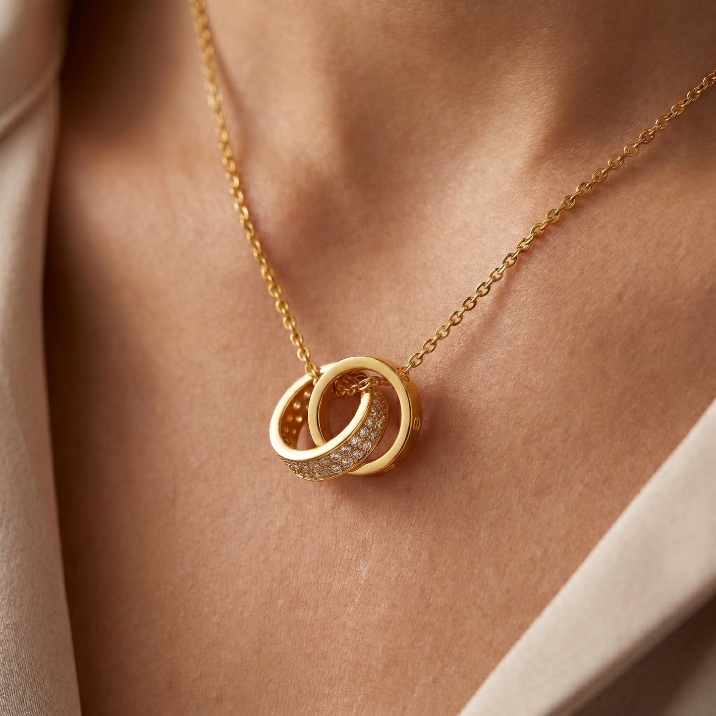 Interlocking Circle Pendant Necklace in gold worn on model, elegant everyday jewellery gift for her