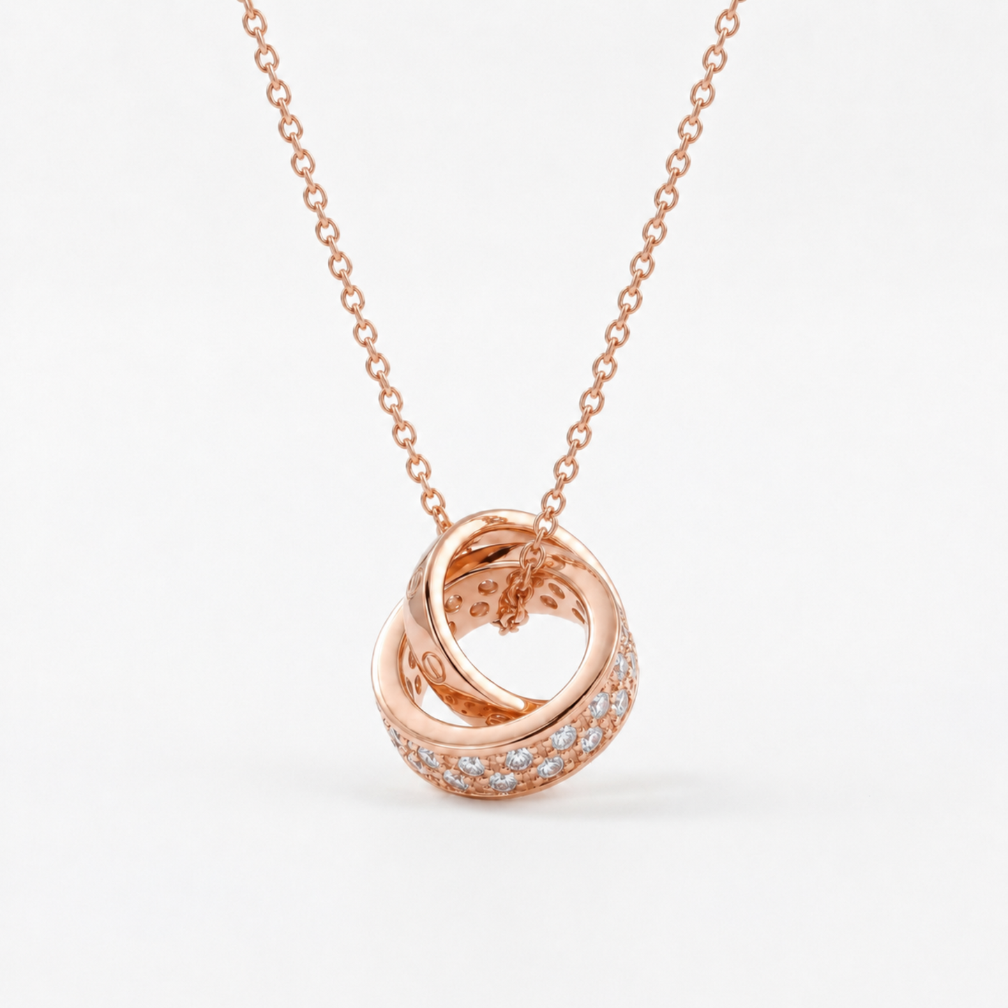 Rose gold Interlocking Circle Pendant Necklace close up with crystal circle pendant