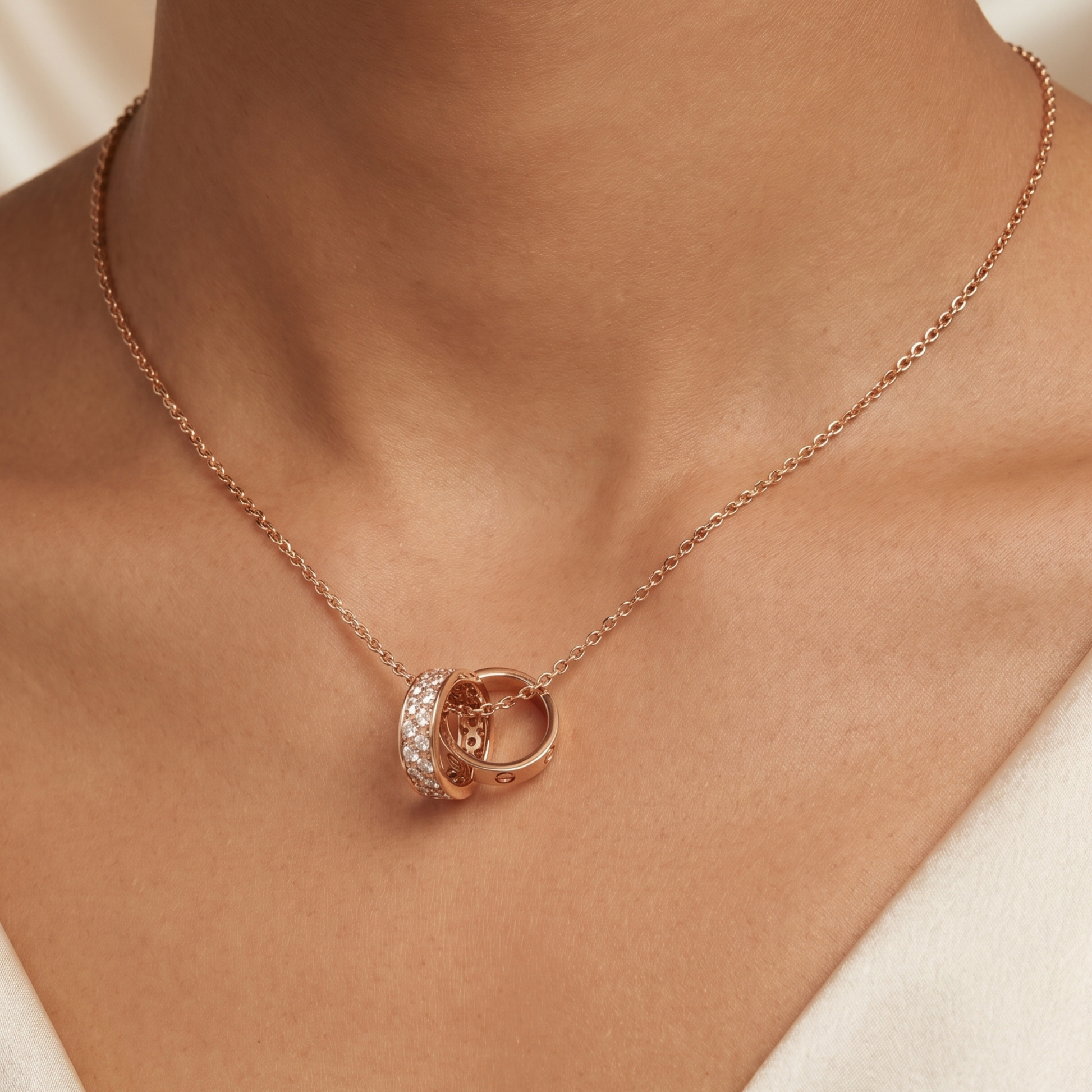 Rose gold Interlocking Circle Pendant Necklace worn on neckline, delicate jewellery gift for women