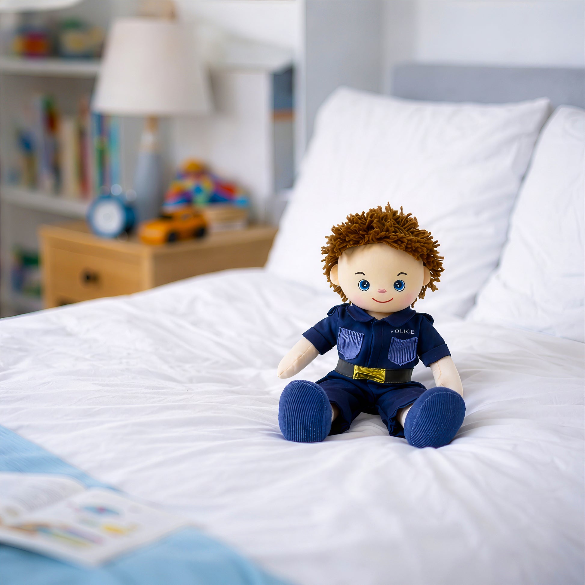 Lewis police plush doll toy styled in kids bedroom