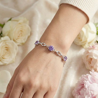 Luminous Love 999 fine silver purple cubic zirconia bracelet worn on wrist, elegant gift bracelet Australia