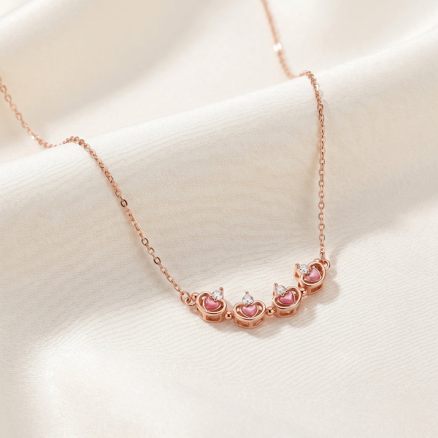 Rose gold magnetic lucky clover necklace opened into delicate petal design