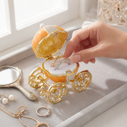 Enchanted Pumpkin Carriage Jewellery Box displaying rings in the removable ring holder