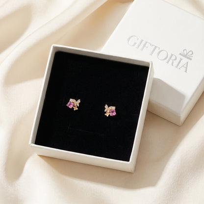 Pink Gold Butterfly Garden stud earrings presented in a Giftoria box