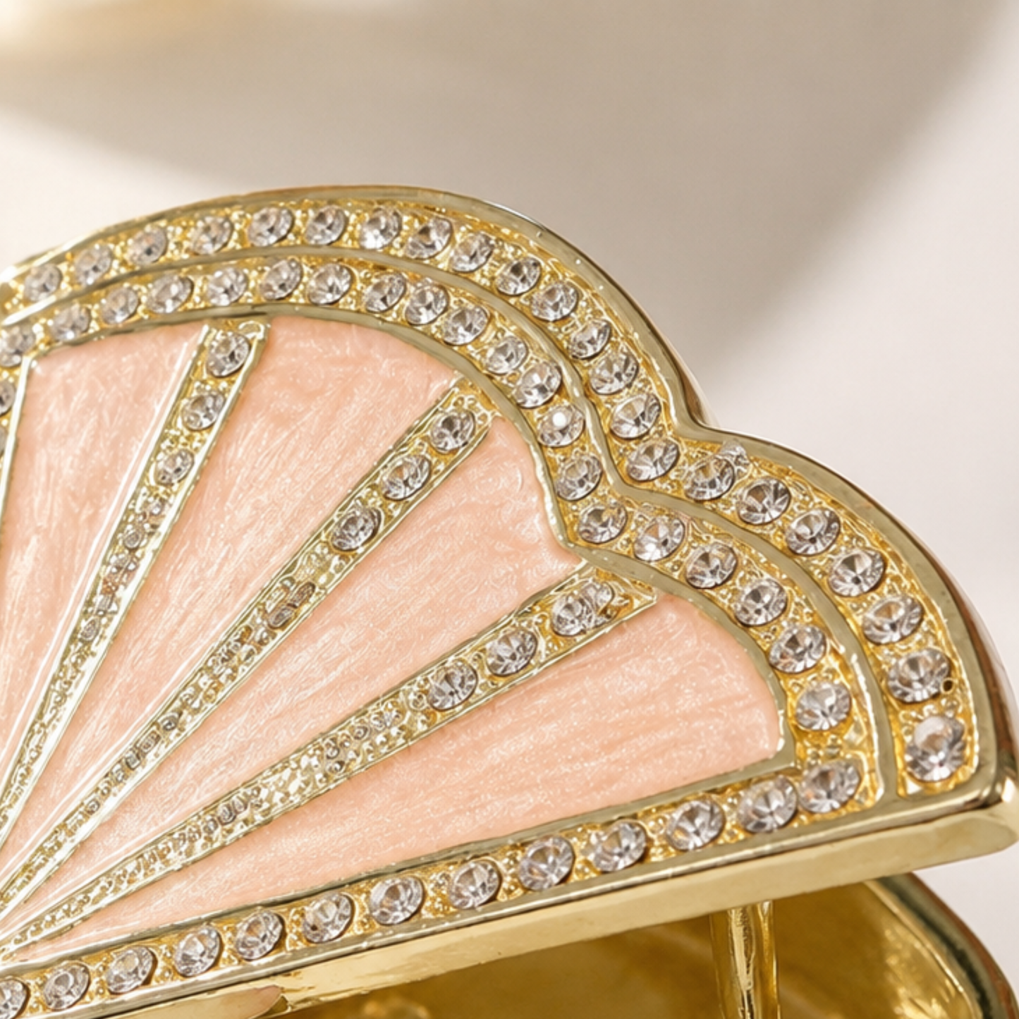 Close-up of sparkling crystal details on the pink piano jewellery box