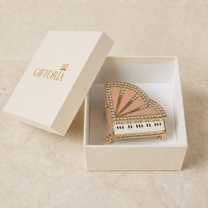Pink grand piano jewellery box presented in a Giftoria gift box