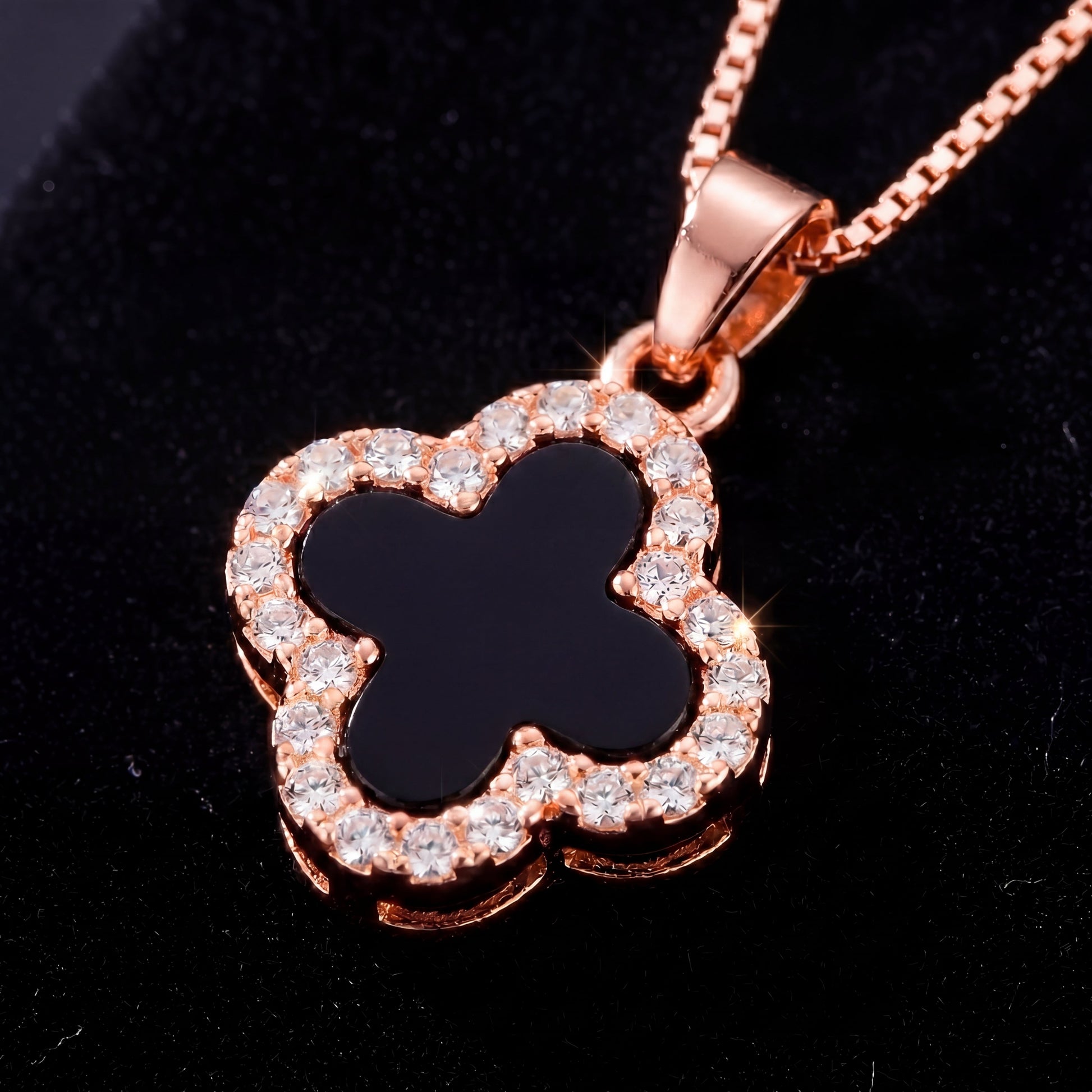 rose gold black four leaf clover pendant necklace close up