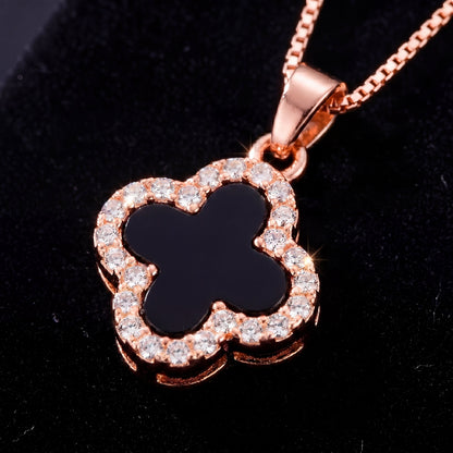 rose gold black four leaf clover pendant necklace close up