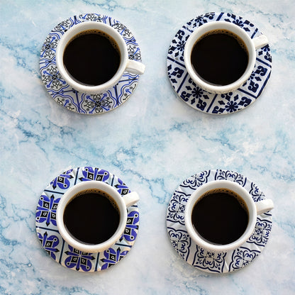 Round ceramic coaster set 4pcs under coffee cups on marble surface