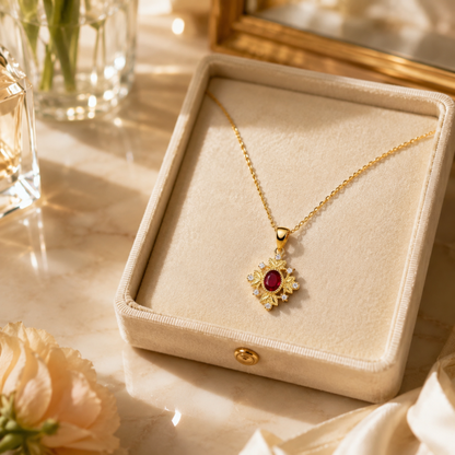 Gold 925 sterling silver ruby red vintage pendant necklace in an elegant jewellery box with flowers