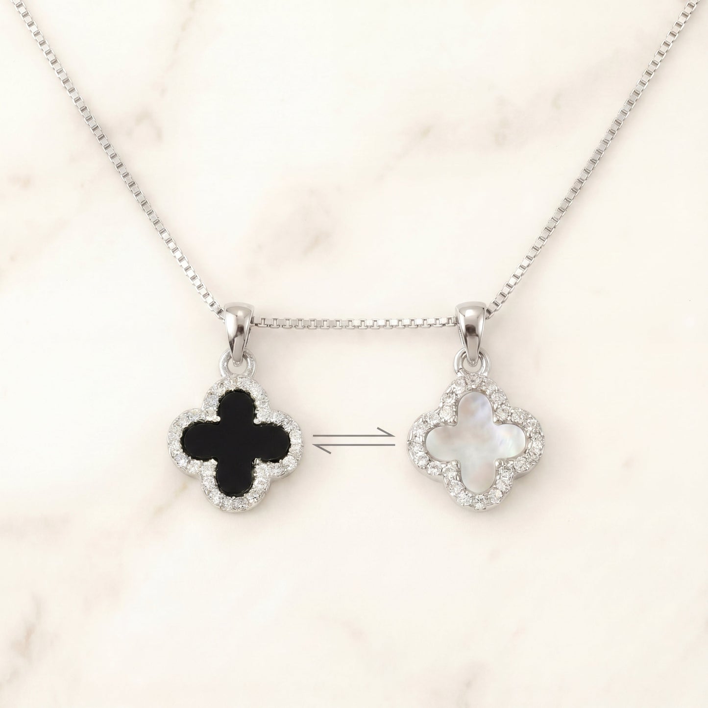 silver 925 sterling silver double-sided four leaf clover necklace showing both sides