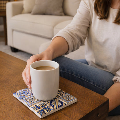 Square ceramic coaster set 4pcs with coffee mug on wooden table in living room