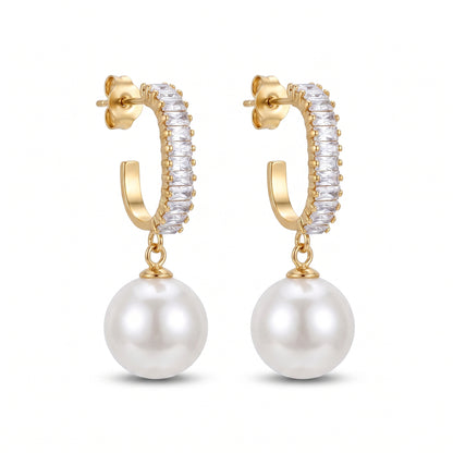 Front view of Statement Sparkling Baguette Pearl Drop Earrings with sparkling gold-tone hoops and round pearl drops