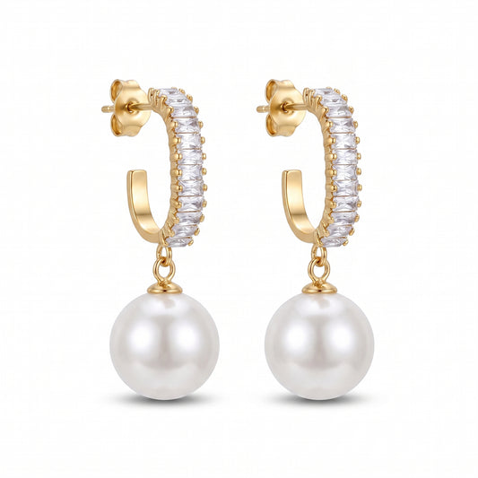 Front view of Statement Sparkling Baguette Pearl Drop Earrings with sparkling gold-tone hoops and round pearl drops