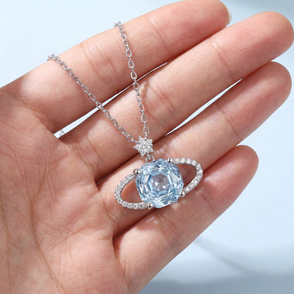 925 sterling silver blue planet star necklace shown in hand for pendant size reference