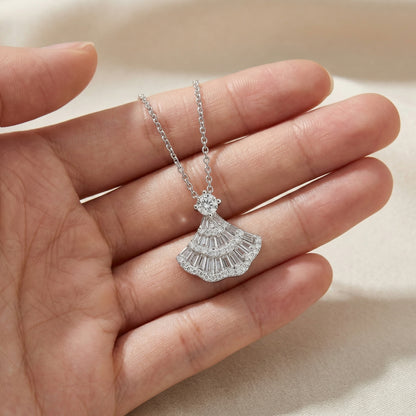 Vintage fan pendant necklace held in hand showing delicate size and sparkling 925 sterling silver detail