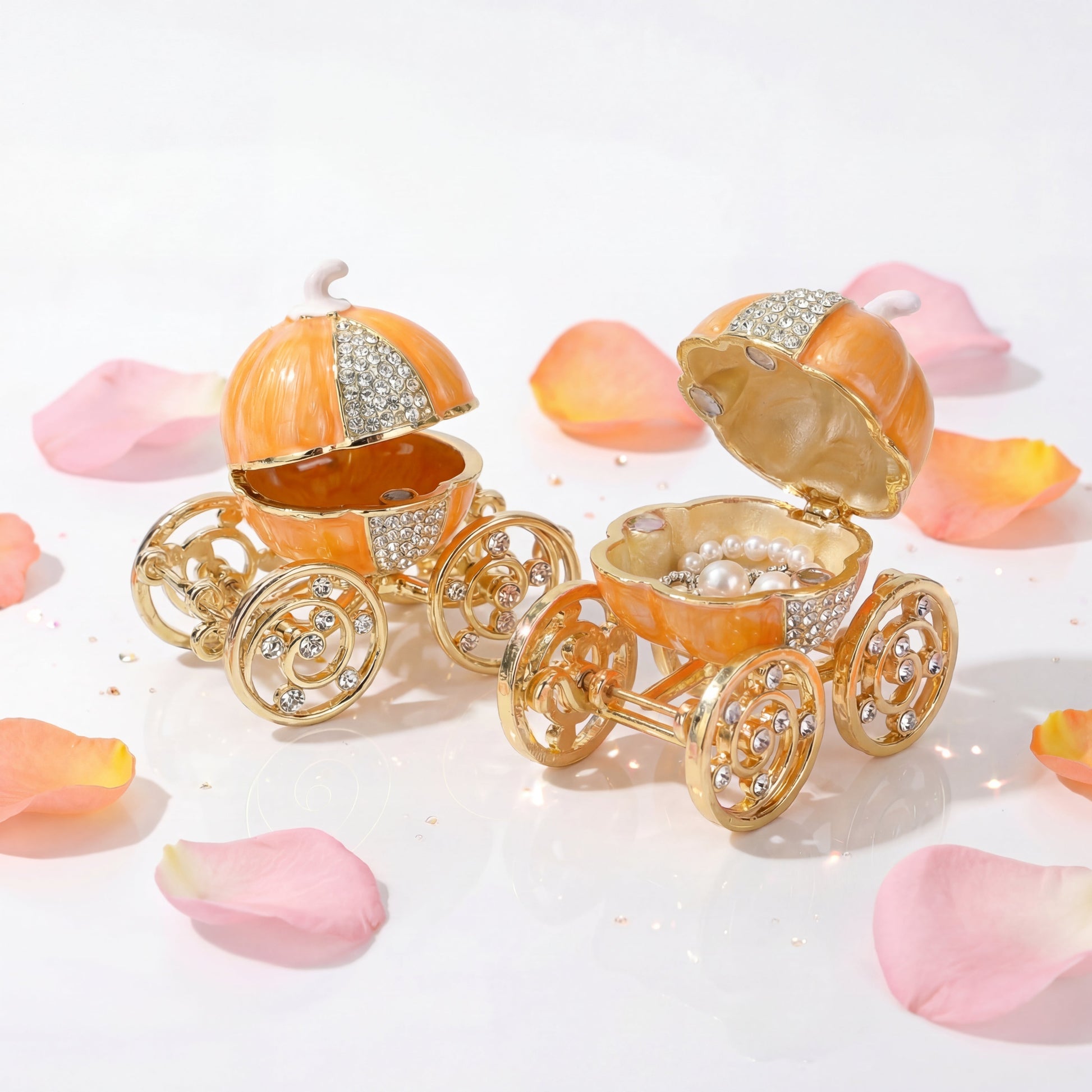 Vintage orange pumpkin carriage jewellery box with gold wheels and sparkling details, a unique decorative gift for her.