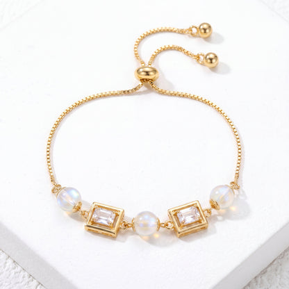 Vintage pearl square cubic zirconia gold bracelet in an adjustable gold finish front view