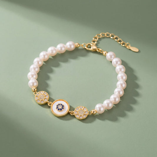 Vintage Pearl Sunburst Bracelet with gold tone details and pearl beaded design