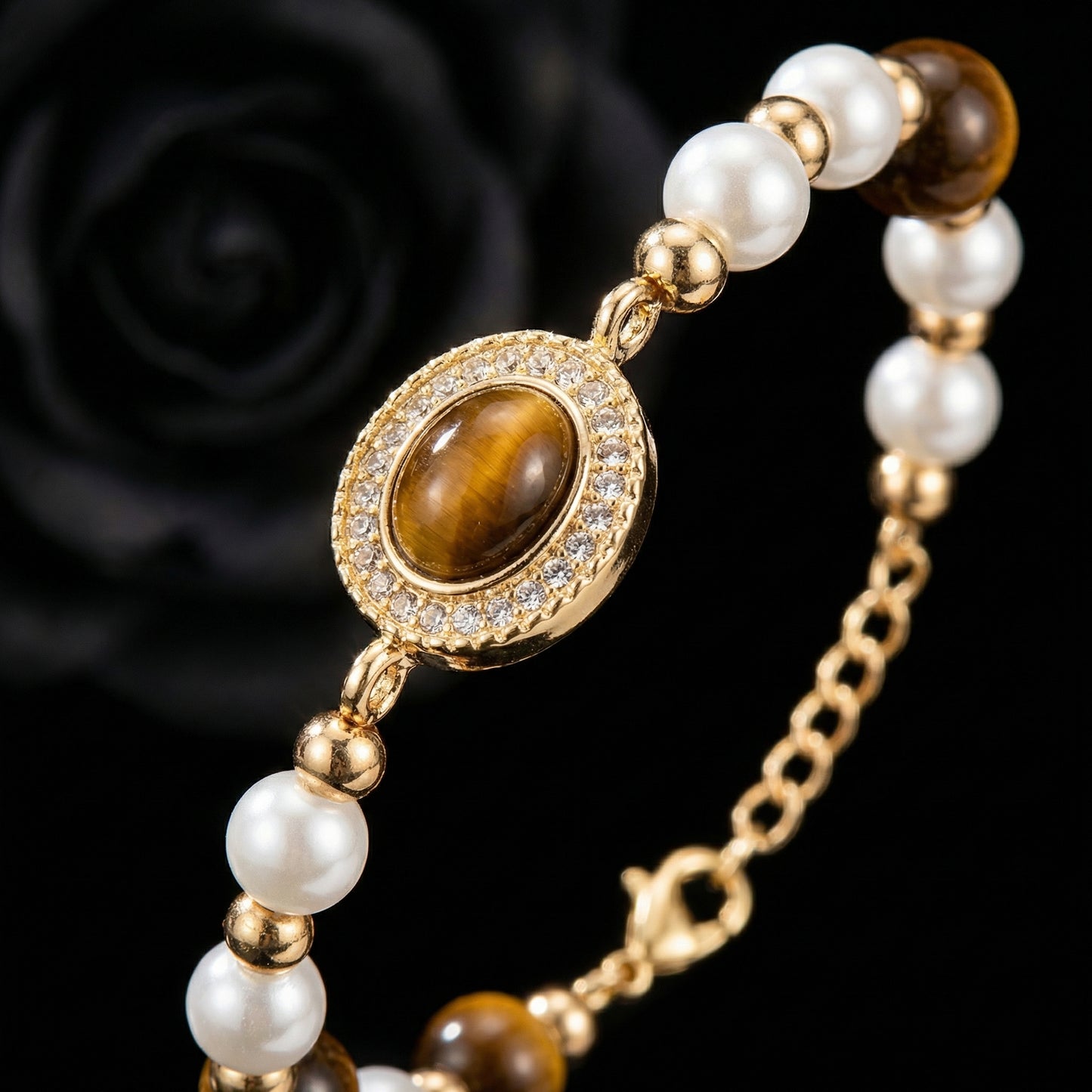 Close-up detail of Vintage Tiger’s Eye & Pearl Gold Tone Bracelet featuring oval tiger’s eye stone, pearl beads and gold tone setting