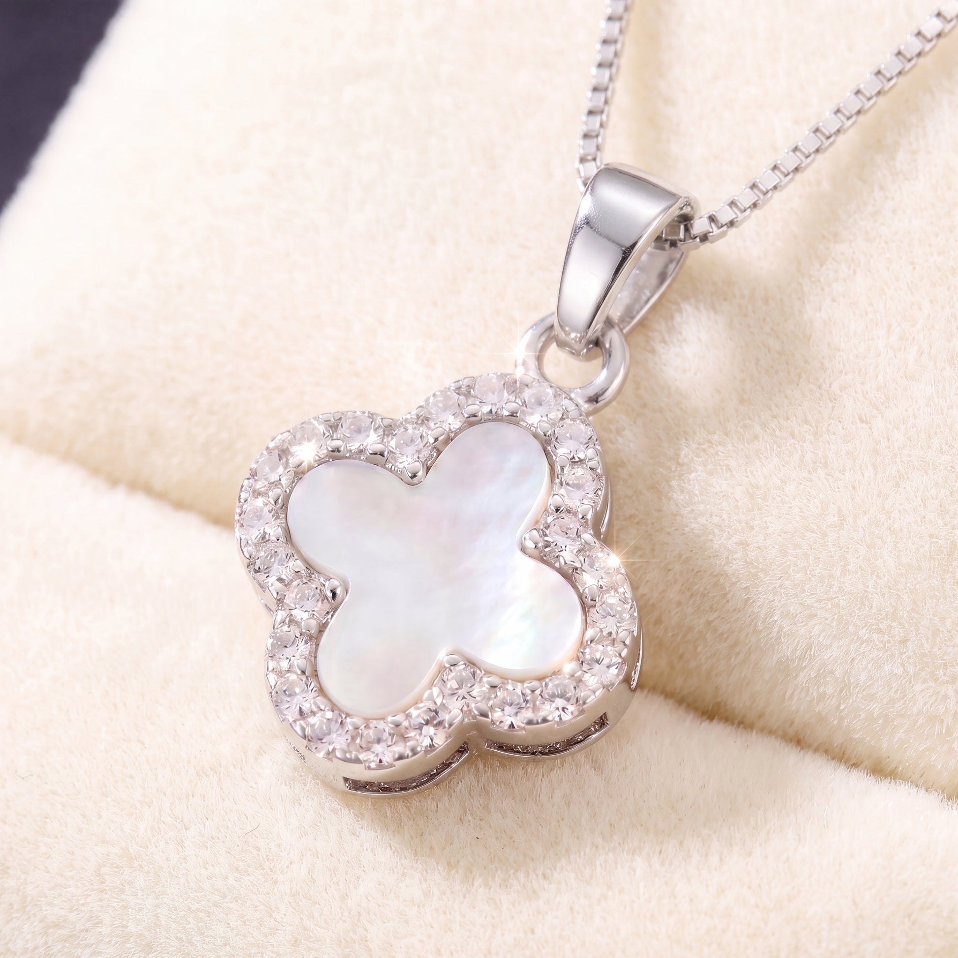 silver whitefour leaf clover pendant necklace close up