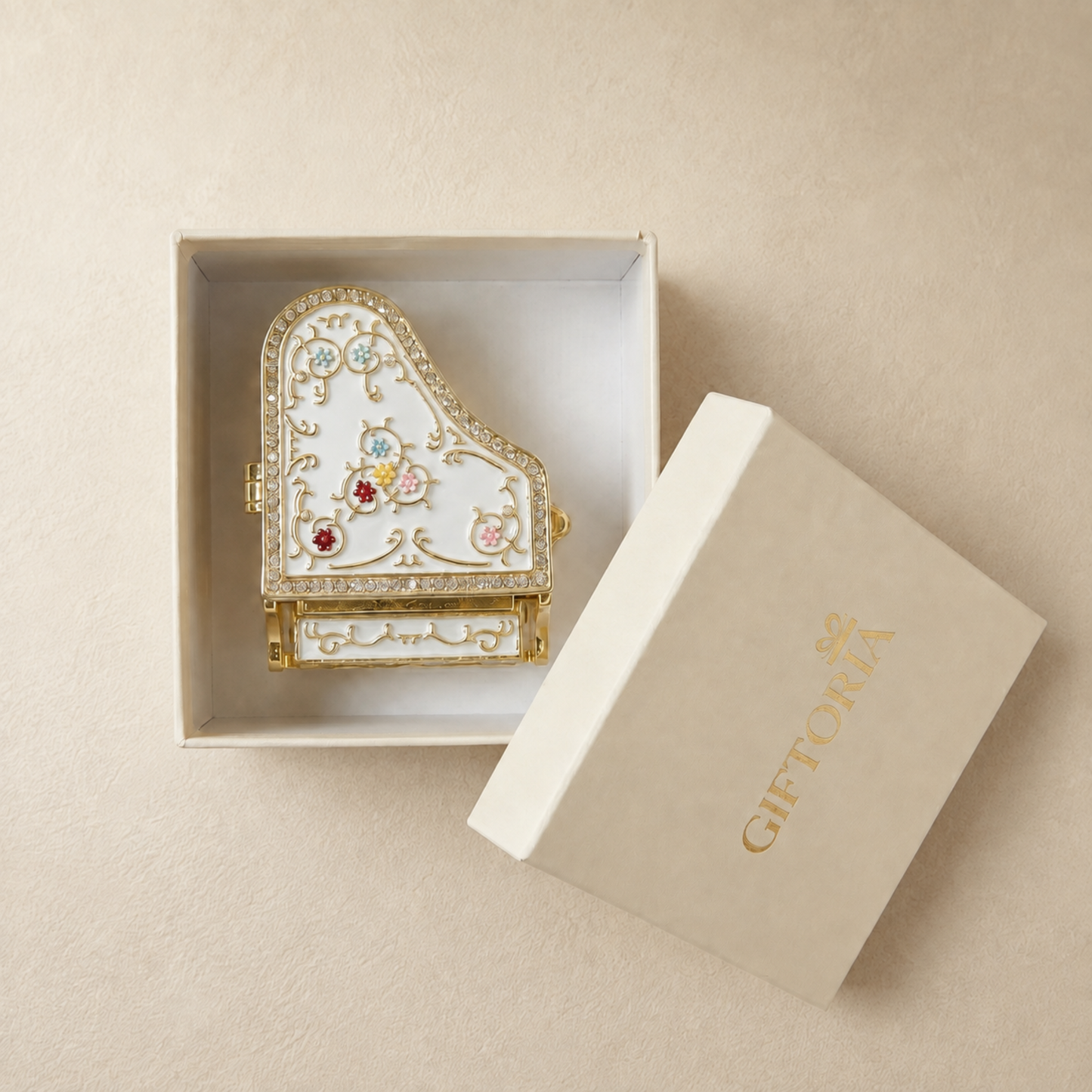 White grand piano jewellery box presented in Giftoria gift packaging